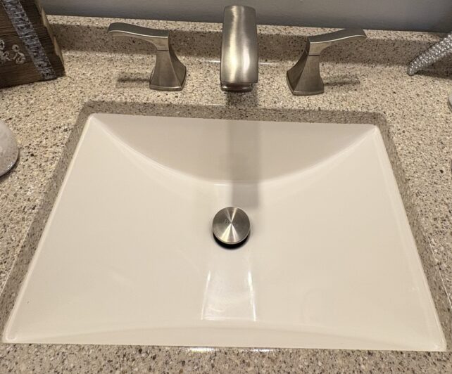 Picture of a sink and the drain.